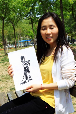 中国日报网：十八禁不卡国产在线播放一女生自学剪纸成功引关注